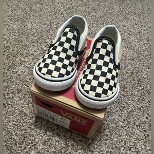 Vans Black and White Checkerboard Slip-Ons
